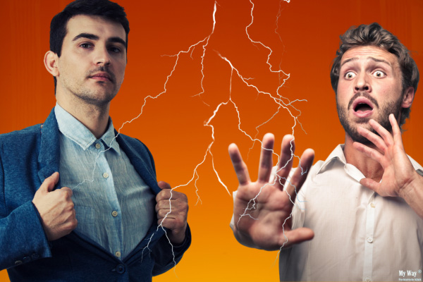 Zwei Männer vor orangefarbenem Hintergrund, einer selbstbewusst, der andere erschrocken mit zur Abwehr erhobenen Händen, Blitze symbolisieren Zukunftsangst und den Umgang mit innerer Anspannung